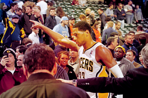 Granger salutes after a game winning shot. Photo courtesy Balls & Lip Gloss.